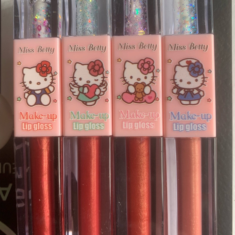 Miss Betty Hello Kitty  Dual Lip Gloss Set of 4.